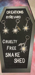 Cruelty Free Snake Shed Sun Keychains With a Snake Charm
